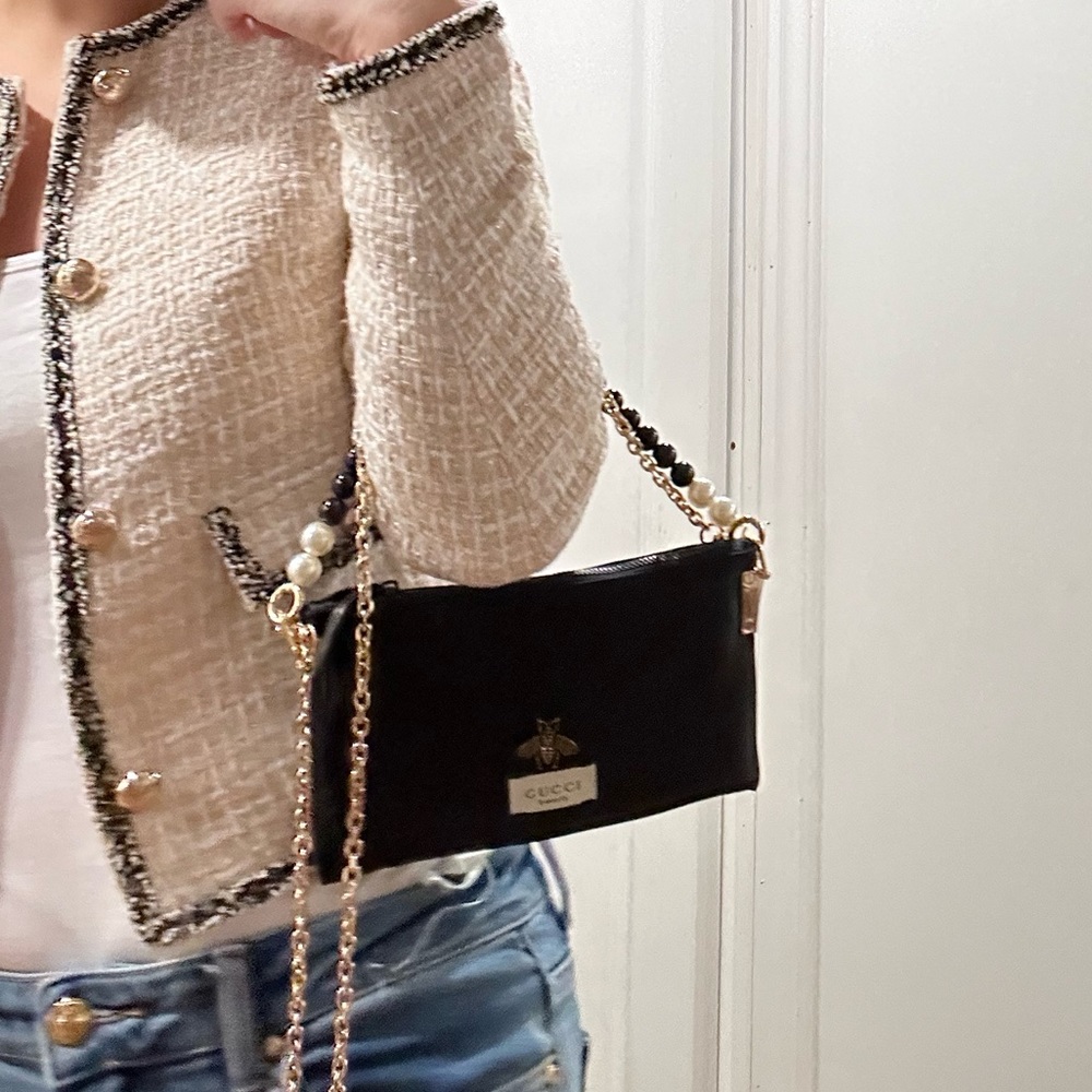 Mini Gucci perfume pouch with chain